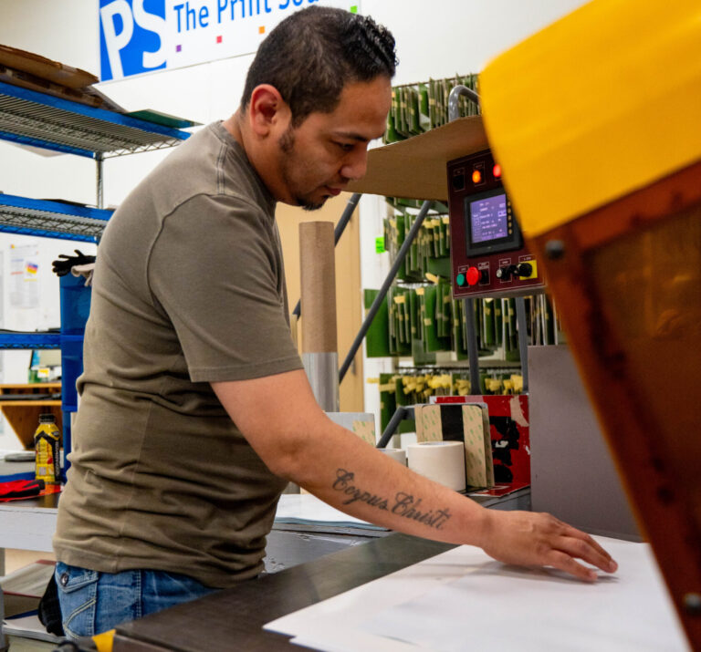 Print Source employee working on an OEM Graphics job.