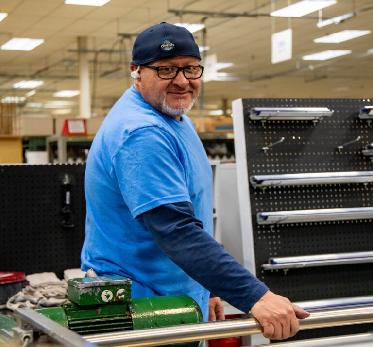 Print Source employee working on a custom print order.