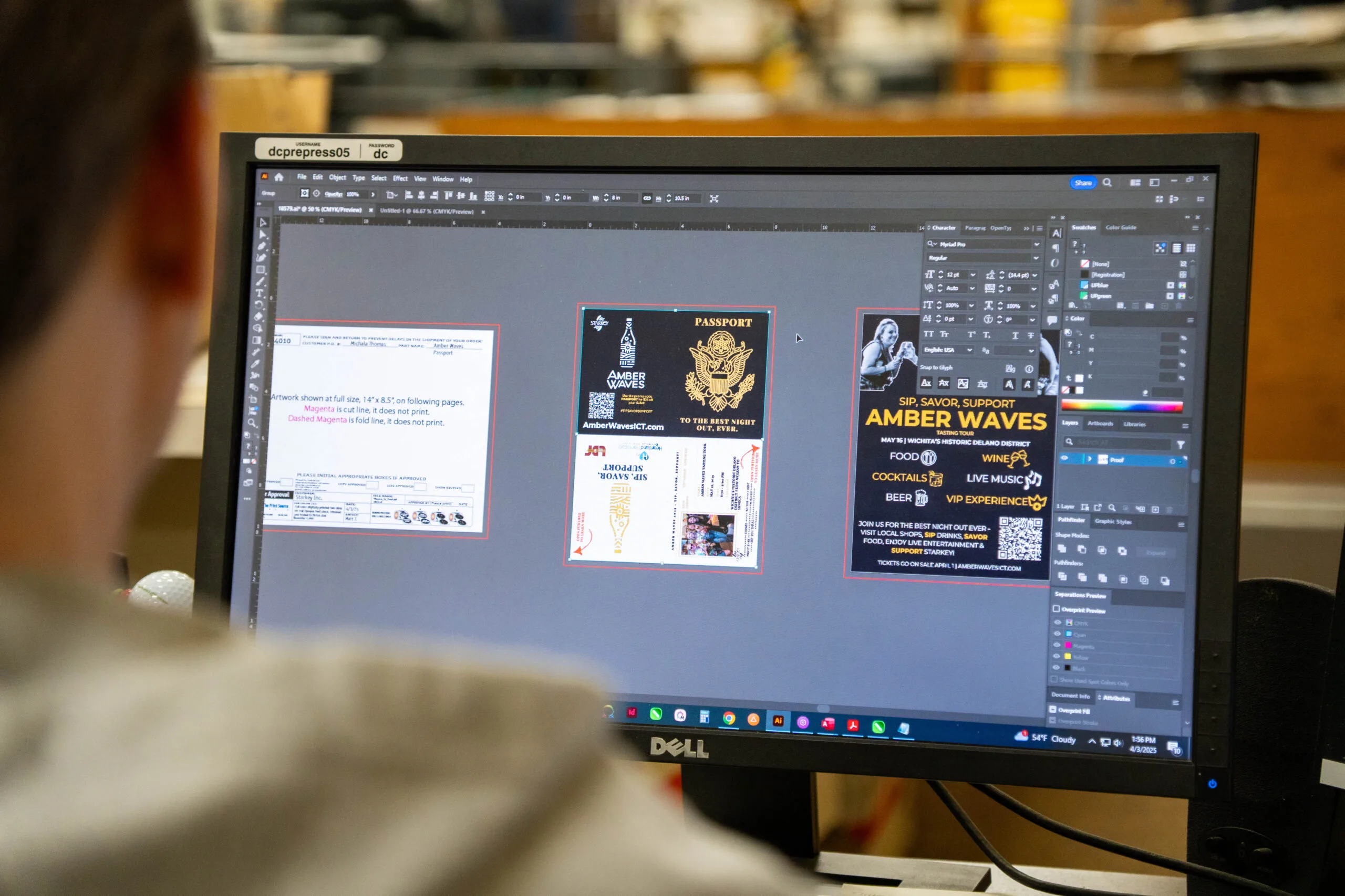 Employee working on print files.