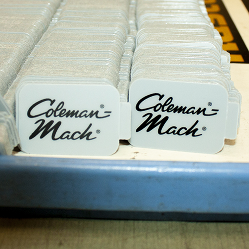 Coleman-Mach plastic tags